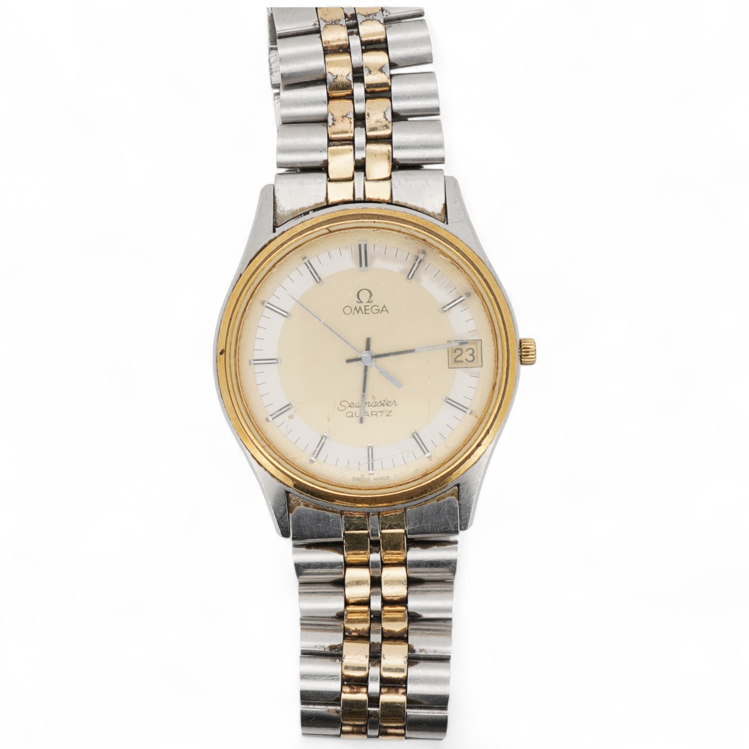 A gentleman's early 1980's stainless steel and gold plated Omega Seamaster quartz wrist watch, with baton numerals and date aperture, movement c.1337, case diameter 34mm, on a steel and gold plated Omega bracelet, with s